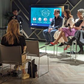 The Women in Leadership panel speakers sat in front of the audience.